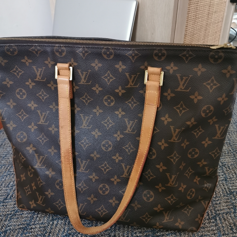 Used in great condition LV bag. Clean inside and out. Some wear seen on handles.